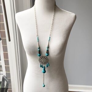 Turquoise beaded long silver medallion necklace